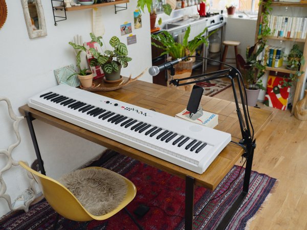 Korg Liano Live 88-Key Digital Piano w/Light Touch Action & Microphone, White